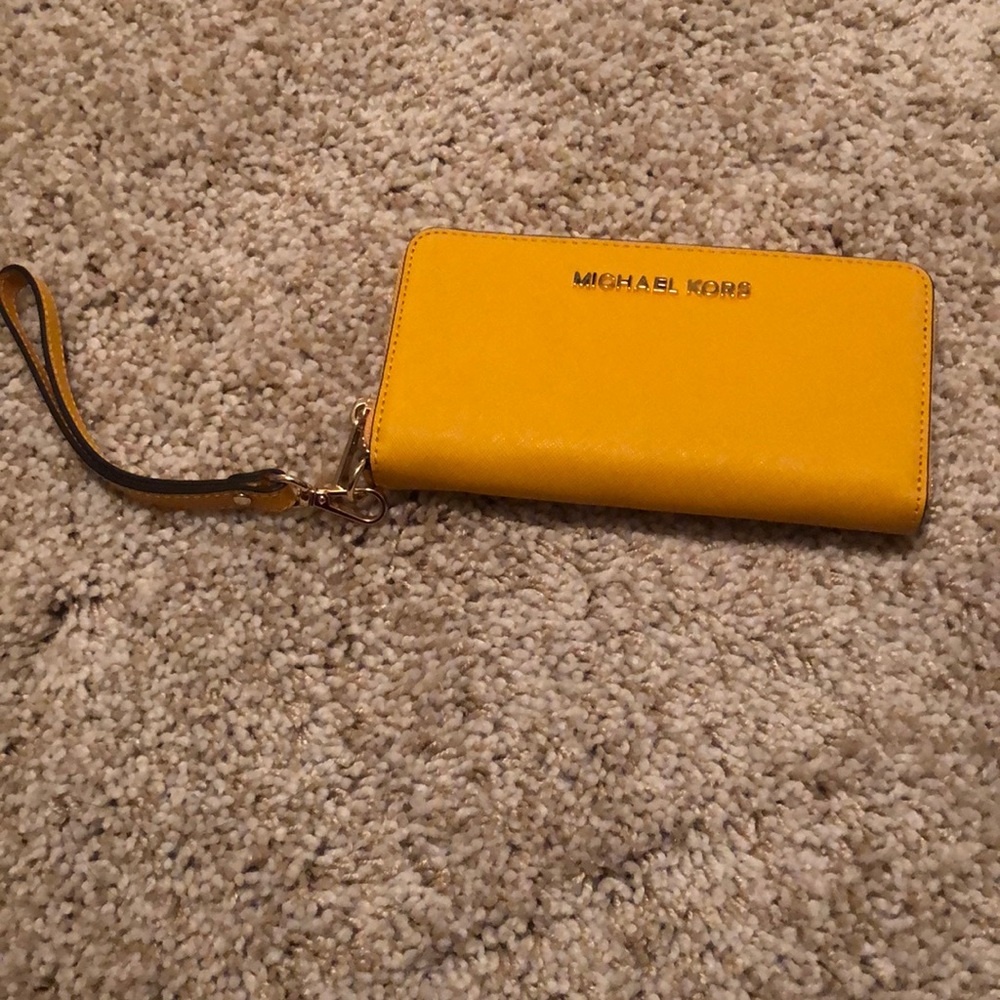 Michael Kors dark yellow zip around wallet